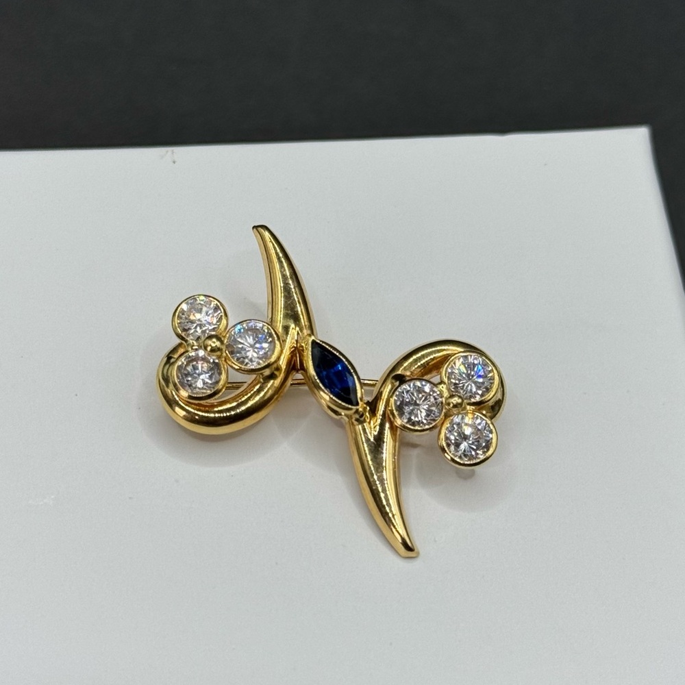 18k real yellow gold brooch with blue and clear stone